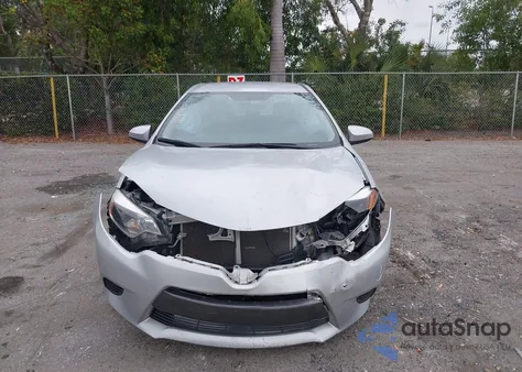 2016 Toyota Corolla Le z USA, uszkodzony, nr VIN 5YFBURHEXGP534933